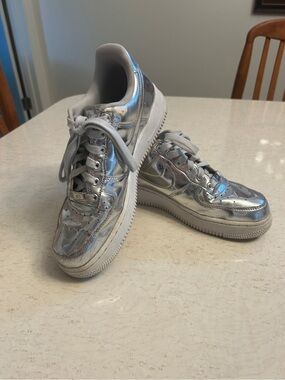 Women’s Nike  Metallic Silver Air Force ones